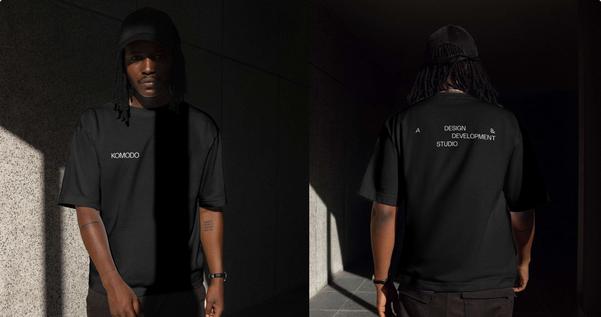 Two photographs of a black Komodo t-shirt worn in low light: the wordmark small on the chest, and on the back the studio line stepped across three lines.